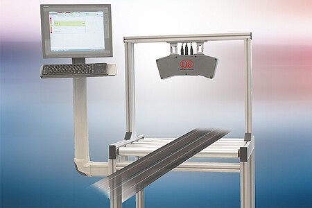 Profile width measurement in extrusion lines