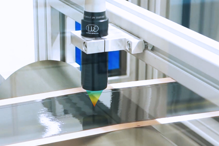 Diktemeting van natte lagen